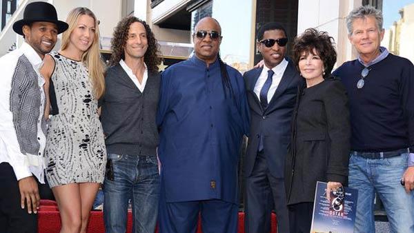 Kenny Babyface Edmonds, Usher, Colbie Caillat, Kenny G, Stevie Wonder, Carole Bayer Sager and David Foster appear at the ceremony for Edmonds, who received a star on the Hollywood Walk of Fame on Oct. 10, 2013. - Provided courtesy of Lionel Hahn/Abacausa/startraksphoto.com