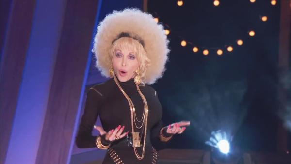 Dolly Parton is seen in a a preview for her appearance on The Queen Latifah Show, which is set to air on Oct. 21, 2013. - Provided courtesy of The Queen Latifah Show Dolly Parton is seen in a a preview for her appearance on The Queen Latifah Show, which is set to air on Oct. 21, 2013. - Provided courtesy of The Queen Latifah Show