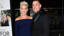 Pink and Carey Hart appear at the premiere of Thank You For Sharing in Los Angeles, California on Sept. 16, 2013.