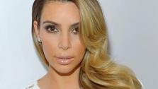 Kim Kardashian poses for a photo in a dressing room before appearing on NBCs Tonight Show With Jay Leno in Burbank, California on Oct. 30, 2013. - Provided courtesy of Michael Simon / Startraksphoto.com