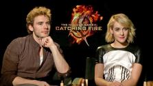 Sam Claflin and Jena Malone appear in an interview with OTRC.com on Nov. 7, 2013. - Provided courtesy of OTRC