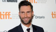 Adam Levine arrives at the premiere of Can A Song Save Your life on day 3 of the Toronto International Film Festival at The Princess of Wales Theatre on Saturday, Sept. 7, 2013, in Toronto. - Provided courtesy of Evan Agostini/Invision/AP