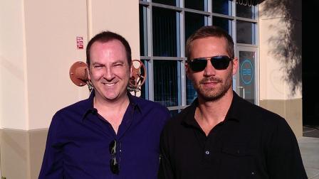 Paul Walkers autopsy results were released on Wednesday, Dec. 4, 2013. In this photo taken about a half-hour before Walker died in a car crash, the actor poses with friend Bill Townsend at a charity event in Valencia.