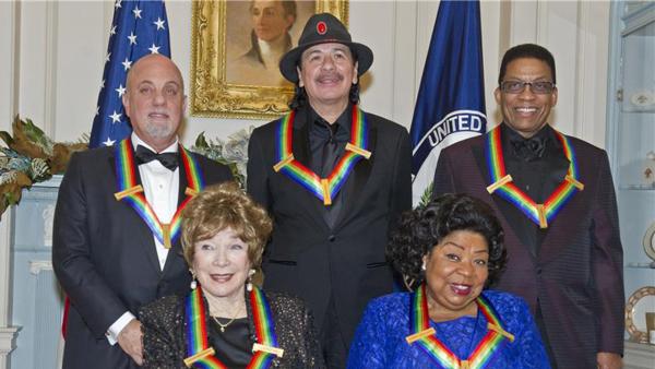 The 2013 Kennedy Center honorees -- Martina Arroyo; pianist, keyboardist, bandleader and composer Herbie Hancock, Billy Joel, Shirley MacLaine and Carlos Santana -- attend a gala in their honor in Washington, D.C. on Dec. 8, 2013. - Provided courtesy of Ron Sachs / Startraksphoto.com The 2013 Kennedy Center honorees -- Martina Arroyo; pianist, keyboardist, bandleader and composer Herbie Hancock, Billy Joel, Shirley MacLaine and Carlos Santana -- attend a gala in their honor in Washington, D.C. on Dec. 8, 2013. - Provided courtesy of Ron Sachs / Startraksphoto.com