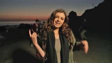 Rebecca Black appears in a still from her music video, Saturday. - Provided courtesy of YouTube.com/Rebecca