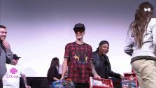 Justin Bieber surprises fans at a screening of his new movie Believe on Dec. 16, 2013. He handed out toys to a lucky group of Beliebers. - Provided courtesy of OTRC