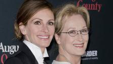 Julia Roberts and Meryl Streep appear at the Los Angeles premiere of August: Osage County on Dec. 16, 2013.