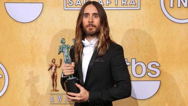 Jared Leto poses in the press room with the award for outstanding performance by a male actor in a supporting role for Dallas Buyers Club at the 20th annual Screen Actors Guild Awards at the Shrine Auditorium on Saturday, Jan. 18, 2014, in Los Angeles. - Provided courtesy of Matt Sayles/Invision/AP