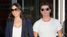 Simon Cowell, former American Idol and The X Factor USA judge, appears with pregnant girlfriend Lauren Silverman in New York on Sept. 19, 2013. The two welcomed a baby boy -- his first child -- on Feb. 14, 2014 -- Valentines Day. - Provided courtesy of Freddie Baez / Startraksphoto.com