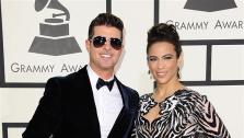 Robine Thicke and wife Paula Patton appear at the 2014 Grammy Awards in Los Angeles on Jan. 26, 2014. It was reported on Feb. 24, 2014 that the couple had separated and plans to end their eight-year marriage. They have one child together. - Provided courtesy of Kyle Rover / Startraksphoto.com