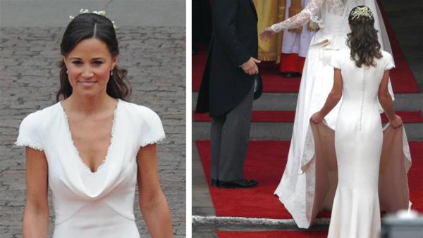Pippa Middleton holds her sister Kate Middletons train at her Royal Wedding to Prince William at Westminster Abbey in London on April 29, 2011. - Provided courtesy of AMH / Startraksphoto.com