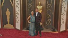Chris Hemsworth and wife Elsa Pataky walk the red carpet at the 2014 Oscars in Hollywood, California on Sunday, March 2, 2014. - Provided courtesy of OTRC