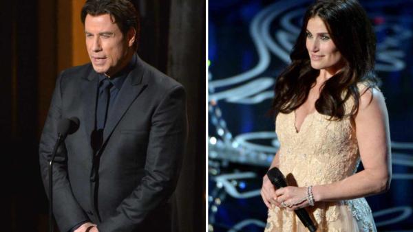 John Travolta and Idina Menzel appear at the 2014 Oscars on March 2, 2014, where he mispronounced her name as Adele Dazeem. - Provided courtesy of John Shearer/Invision/AP