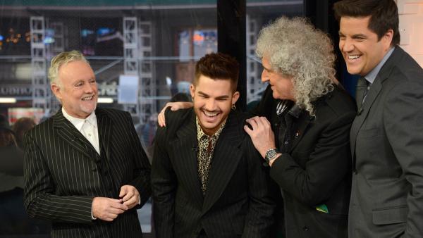 Adam Lambert appears with Queen members Brian May and Roger Taylor on ABCs Good Morning America as co-anchor Josh Elliot looks on. The American Idol alum announced he is touring with the legendary rock group. - Provided courtesy of ABC / Ida Mae Astute