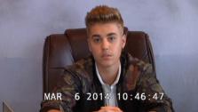 Justin Bieber appears in a video deposition in Miami on March 6, 2014, stemming from a civil assault case filed against him by a former bodyguard. - Provided courtesy of Miami Universal Court Reporting Office