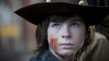 Chandler Riggs (Carl Grimes) appears in a scene from AMCs The Walking Dead, season 4 finale, episode 16 -- A -- that aired on March 30, 2014. - Provided courtesy of Gene Page / AMC
