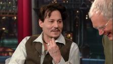 Johnny Depp appears on The Late Show with David Letterman on April 3, 2014. He talked about his engagement to Amber Heard and explained why he is wearing a chicks ring. - Provided courtesy of CBS
