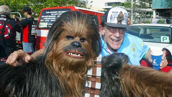 Peter Mayhew appears with a person dressed as Chewbacca at the Supanova Pop Culture Expo in Queensland, Australia on April 6, 2014. The Hollywood Reporter says the actor will eprise his role in Star Wars: Episode VII. - Provided courtesy of Andrew Carlile / Startraksphoto.com