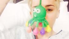 Miley Cyrus appears with a toy in a hospital bed, as seen in a photo she tweeted on April 15, 2014. A statement from the Sprint Center in Kansas City said her concert was canceled and that she was hospitalized for an allergic reaction to antibiotics. - Provided courtesy of twitter.com/MileyCyrus/status/456202359765729280/photo/1 / pic.twitter.com/7FJFxYa7M5