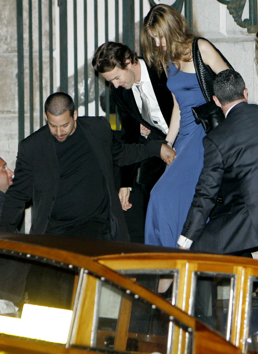 Edward Norton, center, leaves 'La Fenice theater...