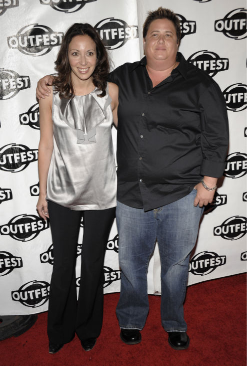 Chaz Bono, right, and Jennifer Elia arrive at a...