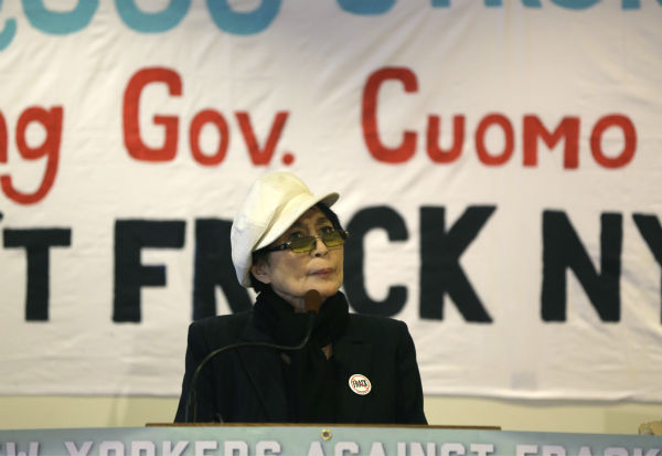 Yoko Ono speaks during a news conference...