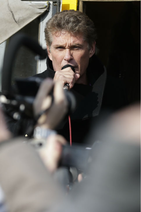 David Hasselhoff speaks to the crowed from a...