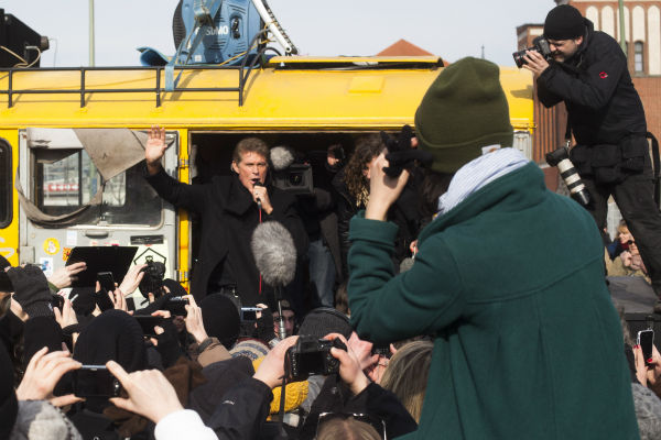 David Hasselhoff, center, speaks to the crowed...