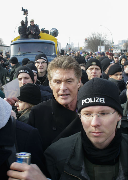 David Hasselhoff, center, is surrounded by...