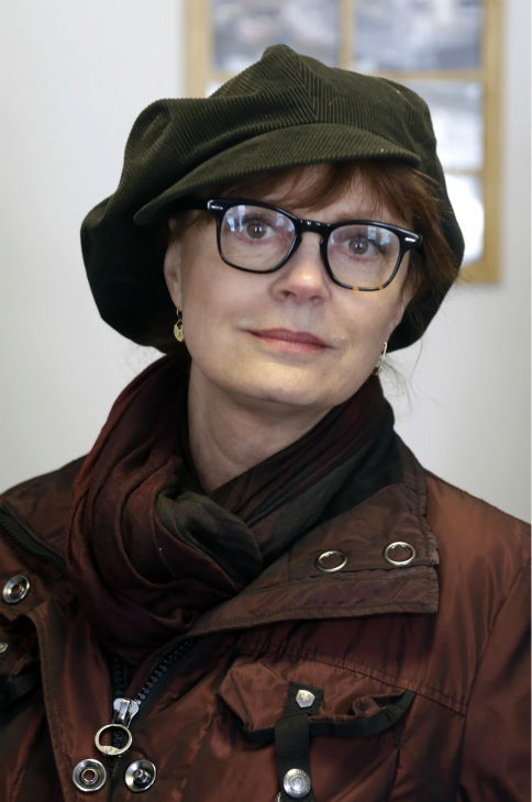 Actress Susan Sarandon visits a family during a...