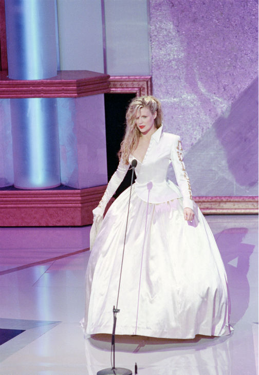 Kim Basinger appears onstage to present an Oscar...