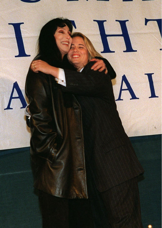 Entertainer Cher embraces her daughter Chastity...