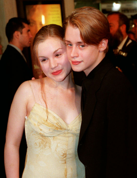 Macaulay Culkin and new wife Rachel Miner pose...