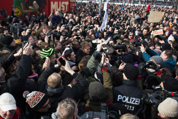 David Hasselhoff, center, arrives for a protest...