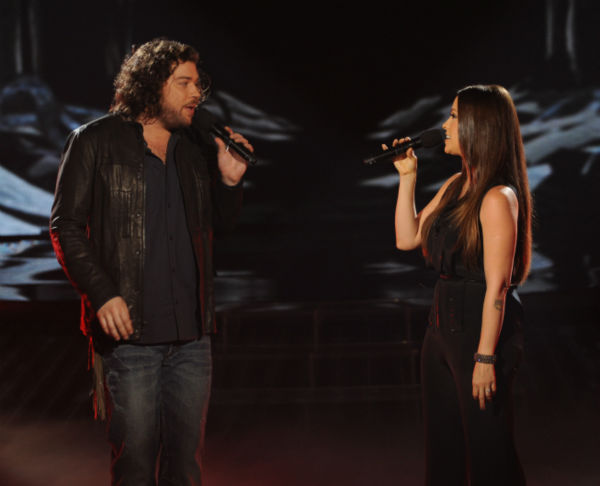 Josh Krajcik (L) and Alanis Morissette perform...