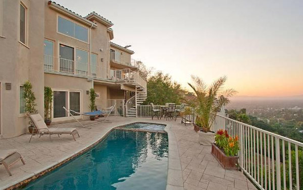 A pool outside the Hollywood Hills home of late...
