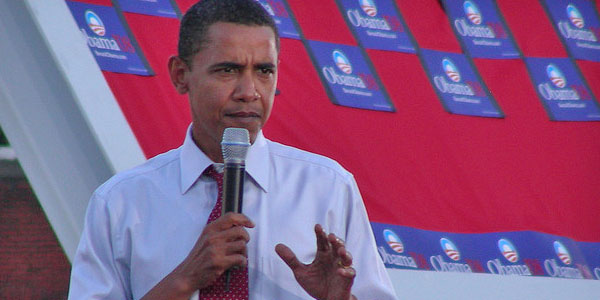 Barack Obama appears in a photo giving a speech...