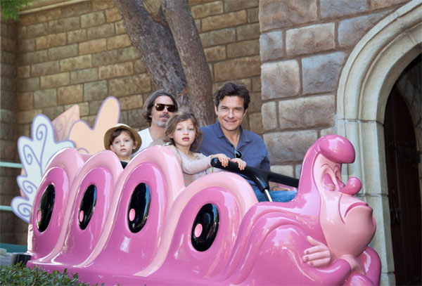 Jason Bateman and daughter Francesca, 5, ride the Alice in Wonderland attraction at Disneyland park in Anaheim, California on Wednesday, March 14, 2012.