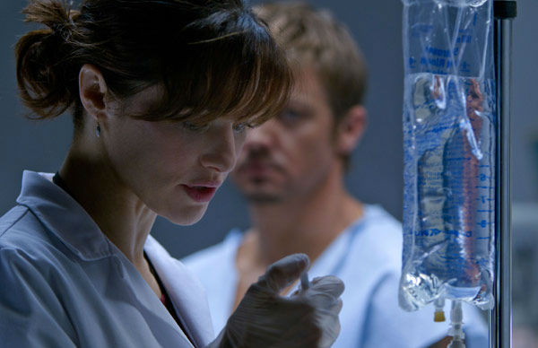 Jeremy Renner and Rachel Weisz appear in a photo...