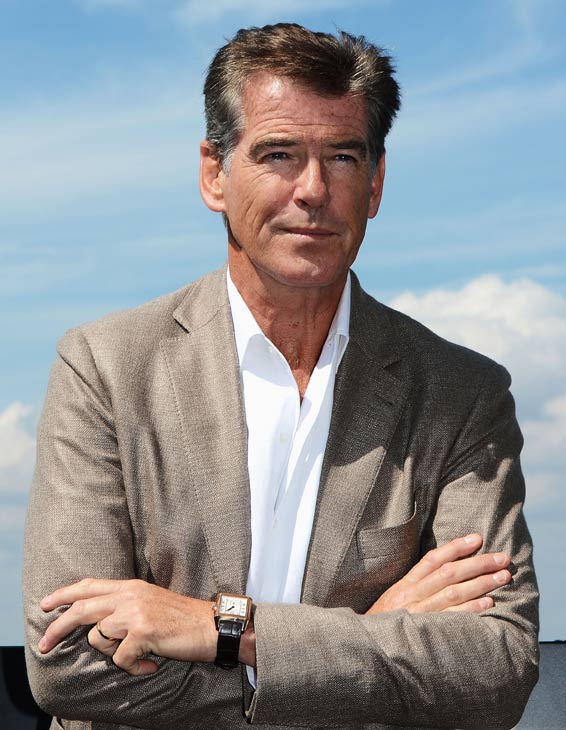 Pierce Brosnan, wearing a suit and a Squadra...