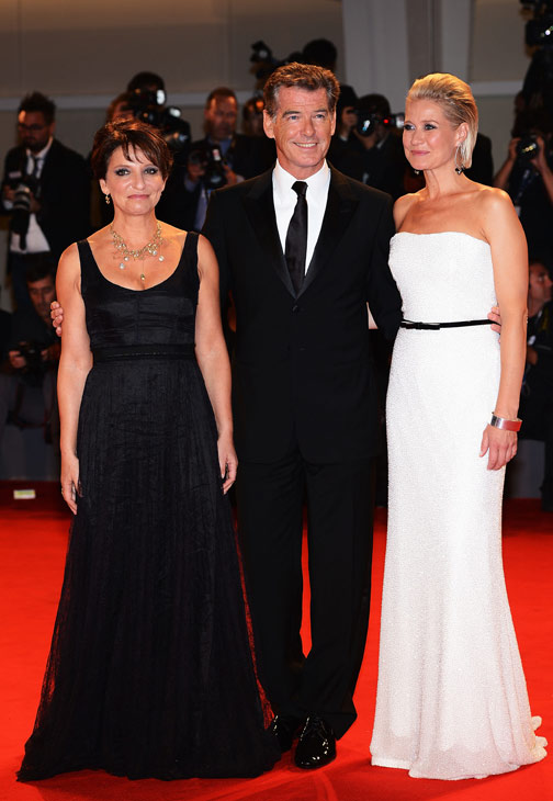 Pierce Brosnan, wearing a suit and a Squadra...