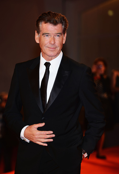Pierce Brosnan, wearing a suit and a Squadra...