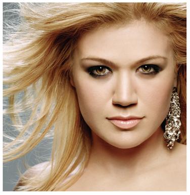 A promotional still of Kelly Clarkson on her...
