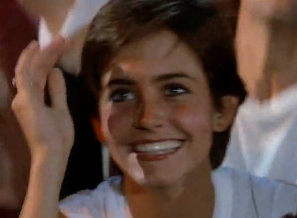 Courteney Cox appears in a scene from the 1984...