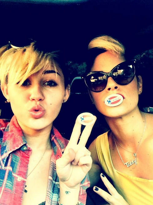 Miley Cyrus appear with makeup artist Denika...