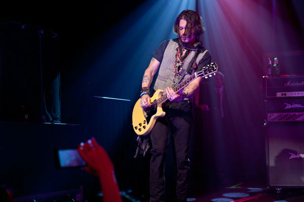 Johnny Depp appears in concert at the premiere...
