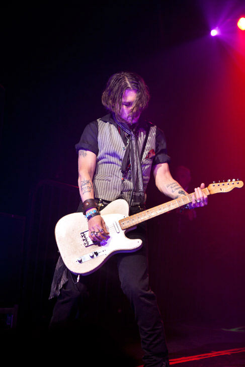 Johnny Depp appears in concert at the premiere party for Warner Bros. Pictures' and Village Roadshow Pictures' 'Dark Shadows,' a Warner Bros. Pictures release, in Hollywood.