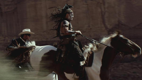 Johnny Depp and Armie Hammer appear as Tonto and...