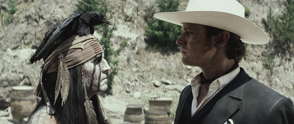 Johnny Depp and Armie Hammer appear as Tonto and...