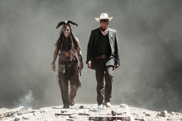Johnny Depp and Armie Hammer appear as Tonto and...